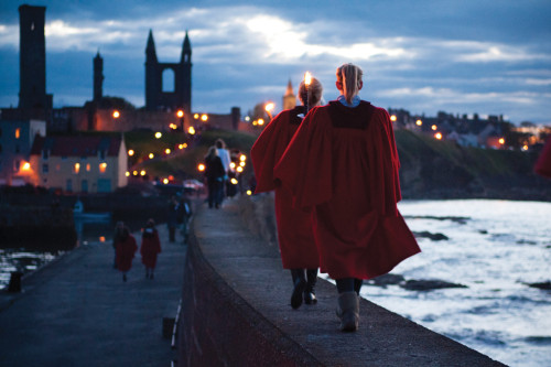 WALK ON: One tradition associated with the University of St. Andrews is the red gown worn by undergraduate students. Most students wear them on special occasions, one of those bring the Pier Walk, which takes place along the pier on East Sands after the St. Salvators Chapel service on Sunday - a precarious journey on a windy day.