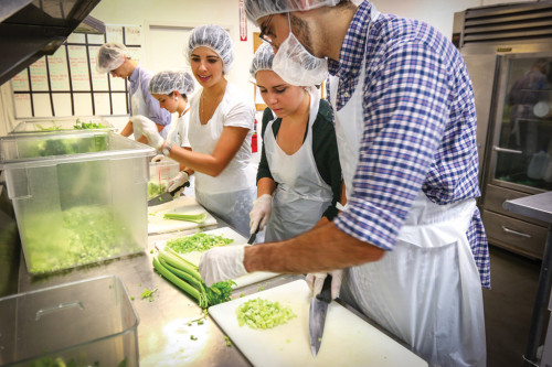 HANDS ON: During the summer, students visit a number of sites around Washington, including a trip to DC Central Kitchen.