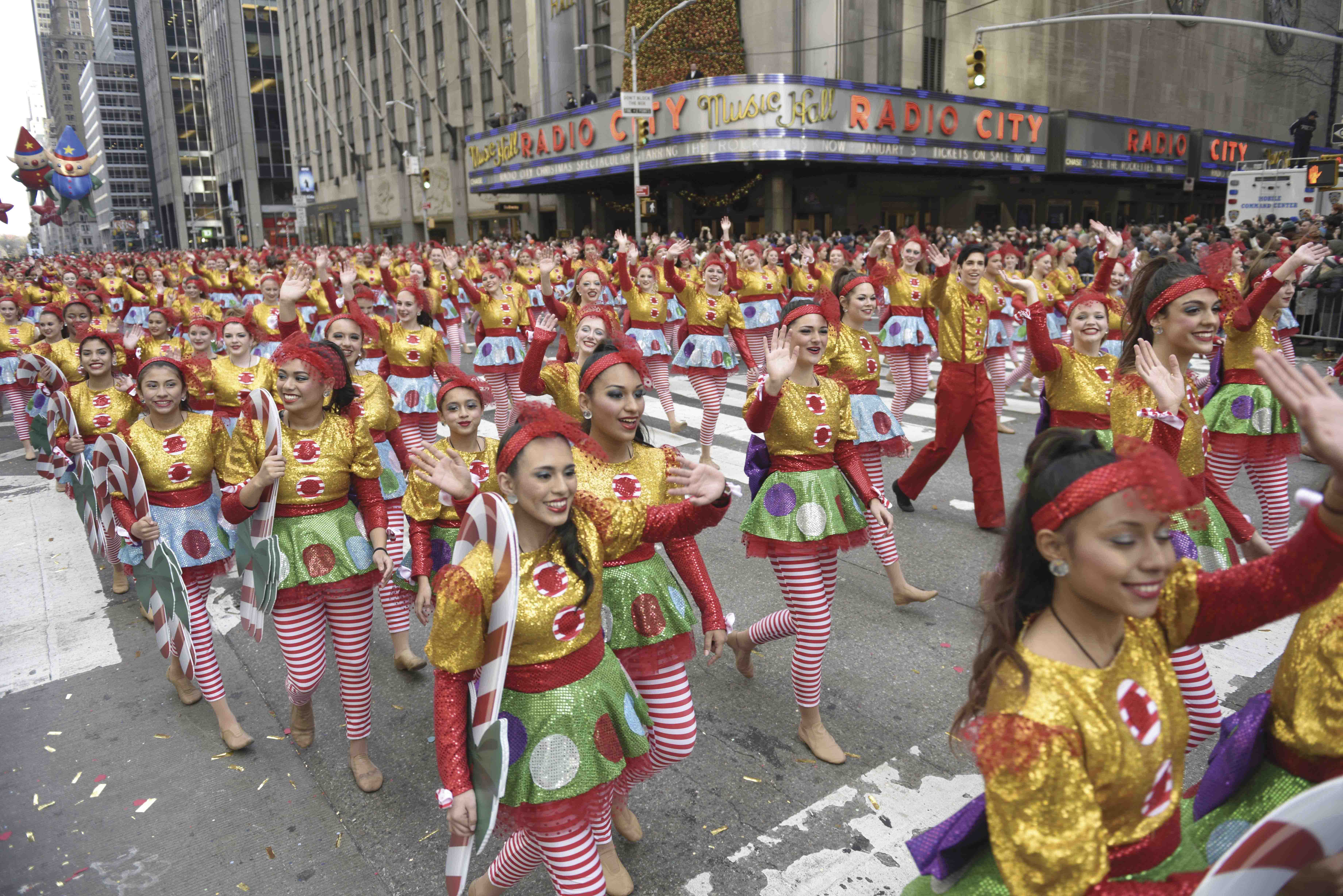 VARIETY SHOW: Drill team girls fill Sixth Avenue during Macy’s Thanksgiving Day Parade.
