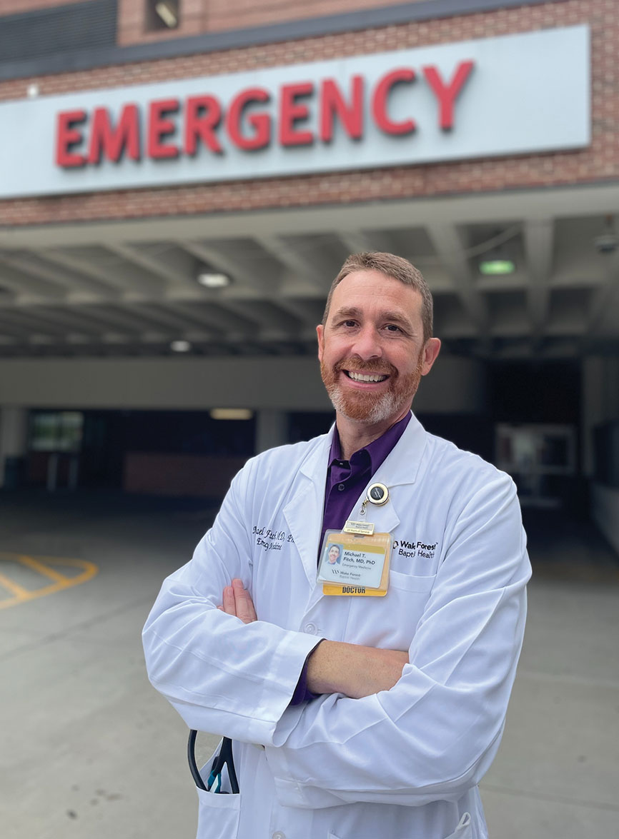 Dr. Michael “Mike” Fitch ’93 outside hospital emergency entrance