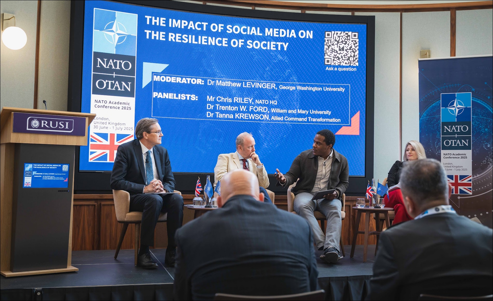 Trenton W. Ford, assistant professor of data science, speaks during NATO’s academic conference on societal resilience in the digital age.