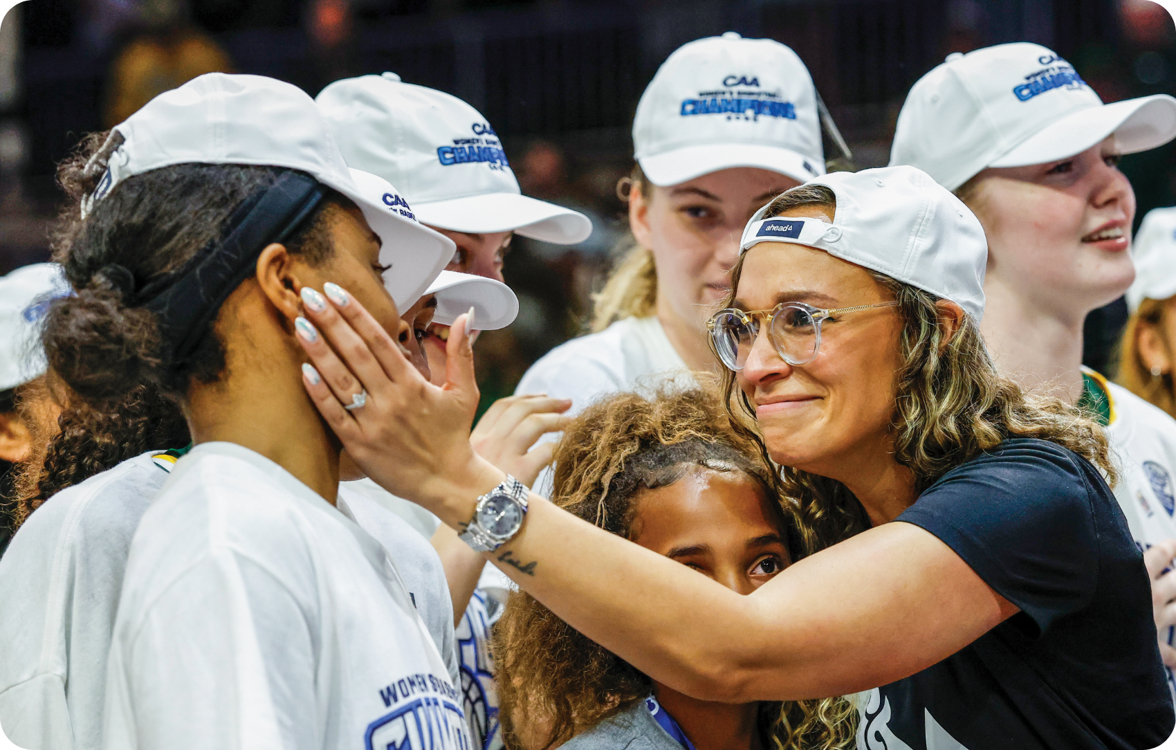 Erin Dickerson Davis sharing a moment with team