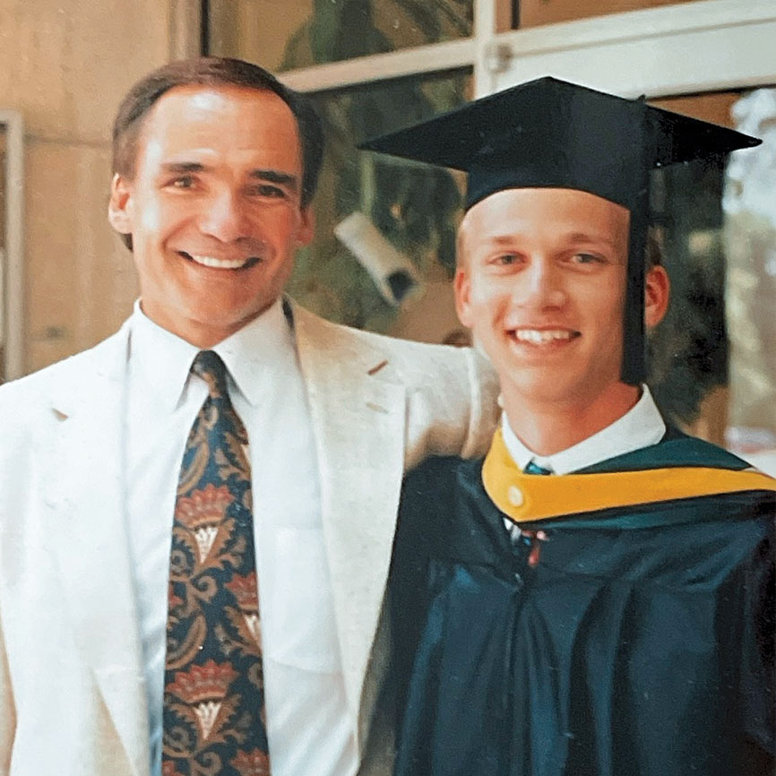 Kambis and Harris at Harris' graduation in 1993.