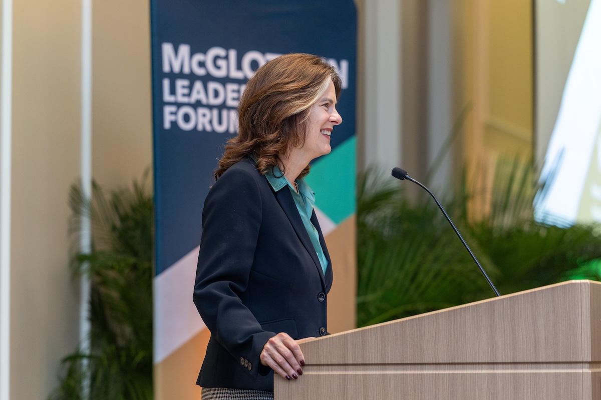 President Rowe at a podium speaking to the attendees of the McGlothlin Leadership Forum