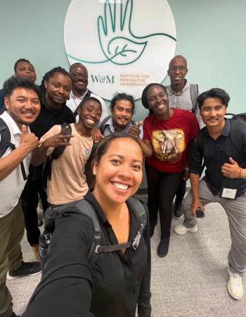 Conservation Catalyst participants pose in front of the IIC sign