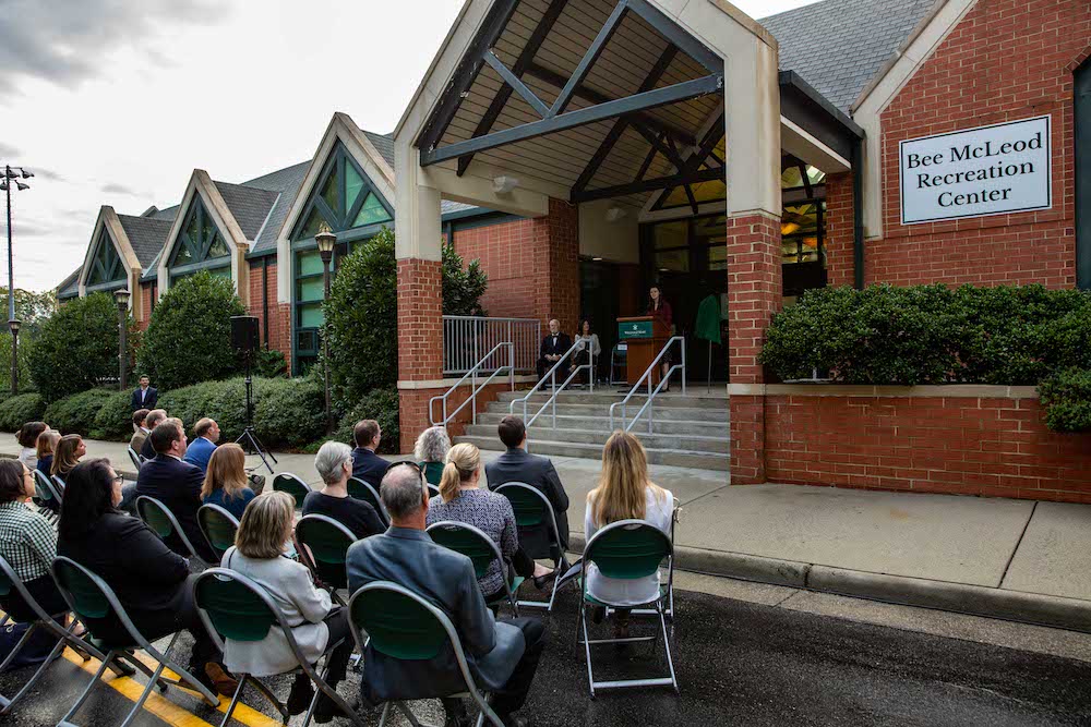 A crowd watches speeches at the Bee McLeod Recreation Center dedication.