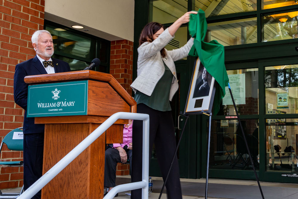 President Rowe unveils a portrait of Bee McLeod at the McLeod Recreation Center dedication.