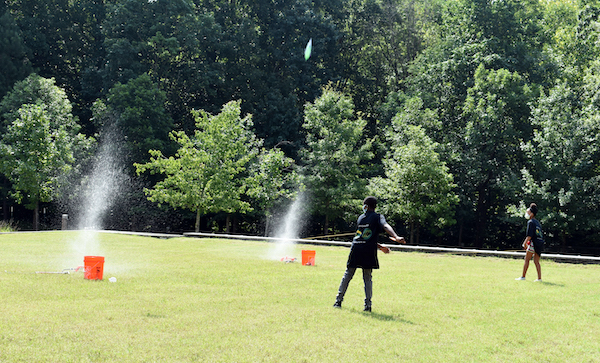 Camp EAGER students launch their bottle rockets.