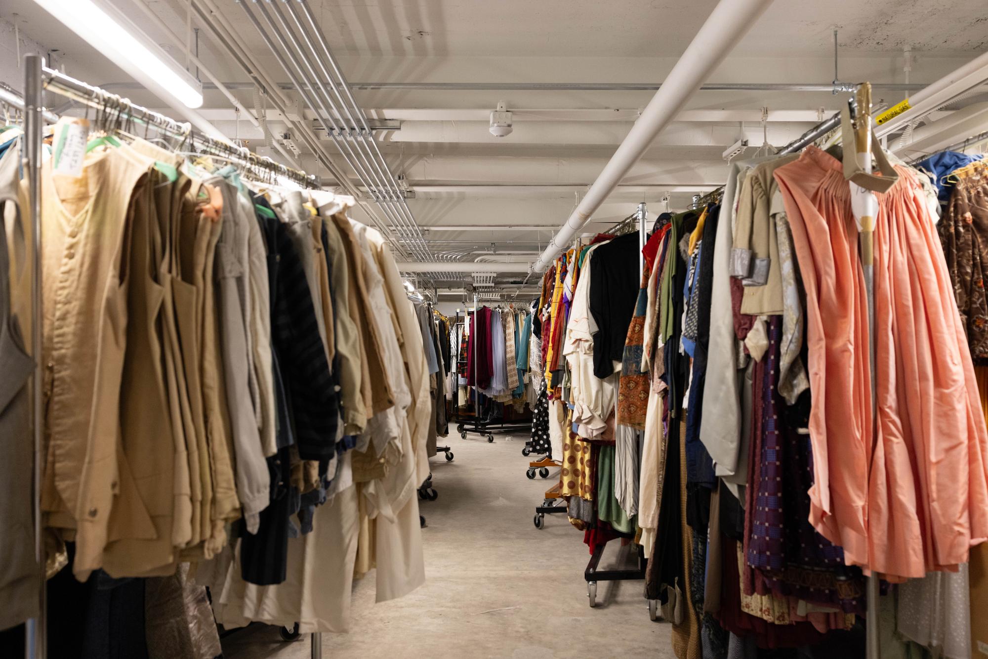 Rows of costumes in the costume department