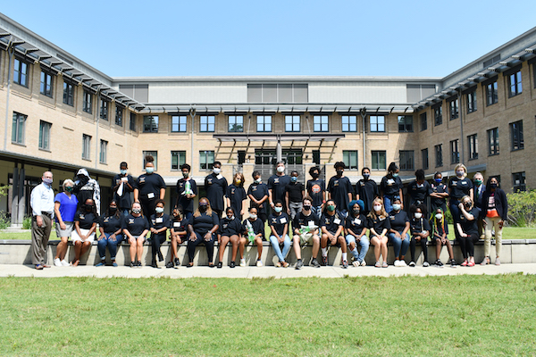 The Camp EAGER campers pose in front of the School of Education.