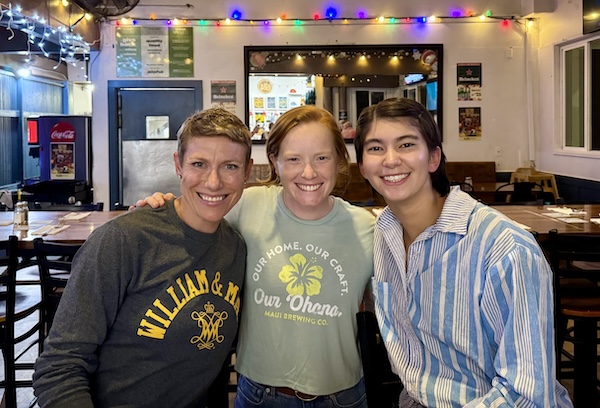 Purser, O'Hara and Corcoran celebrating Yule Log in Hawaii