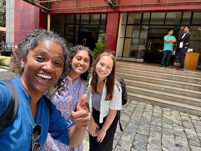 Nara Sritharan with students in Nepal